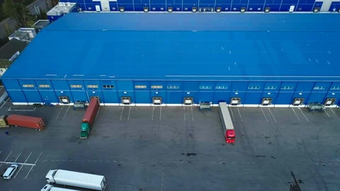 Aerial top view of the large logistics park with warehouse with some tracks Stock Footage 129053608