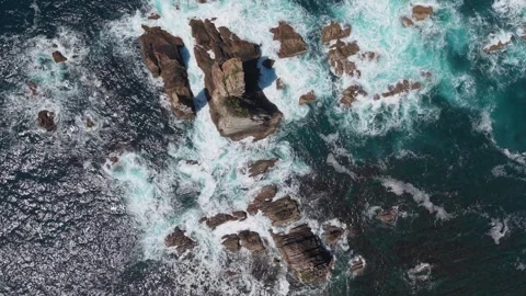 Aerial top view of a lighthouse point with reef and surf Vídeos de archivo 343325200