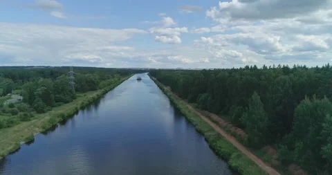 From Aerial top view to low point view on cargo ship and artificial water Stock Footage 157835308