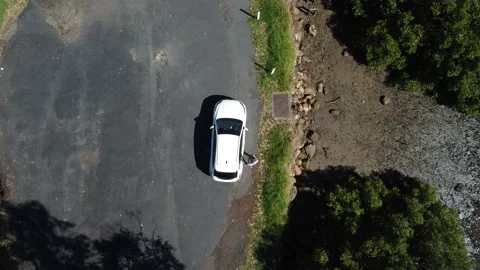 Aerial Top View Man Get In The Car And Closing The Door Stock Footage 239575454