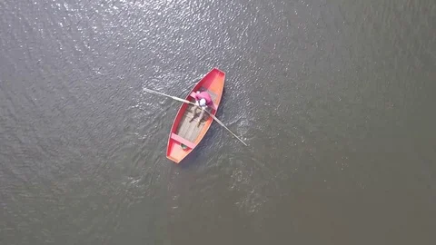 Aerial top of view of man rowing a row boat on the canal, Netherlands Stock Footage 84973307