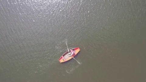 Aerial top of view of man rowing a row boat on the canal, Netherlands Stock Footage 85010945
