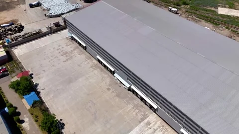Aerial Top View of a Modern Logistics Warehouse with Loading Docks Stock Footage 339245163