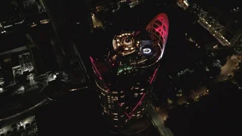 Aerial Top View of a Modern Skyscraper at Night in Bangkok, Thailand Stock-Footage 331339436