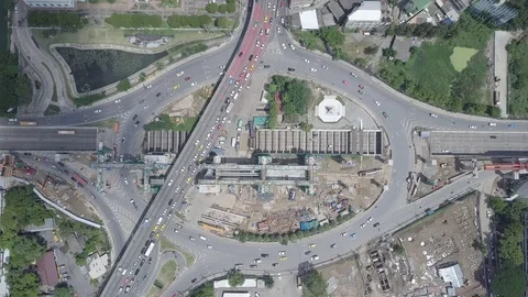 Aerial top view moving down of public transport train construction roundabout Stock Footage 92109623
