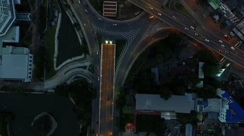 Aerial top view moving pass the roundabout traffic night with car moving Stock Footage 68358189