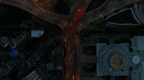 Aerial top view moving up scene over roundabout traffic circle with car moving Stock Footage 68358409