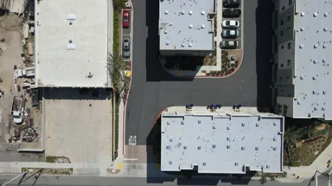 Aerial Top View of Multiple Condominium Buildings and Rooftops Stock Footage 150896262