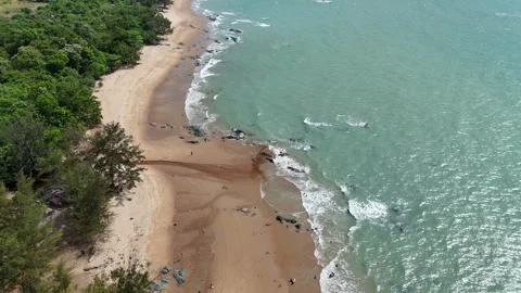 Aerial Top View of Ocean Waves Crashing on Sandy Beach with Rocks Stock Footage 331865579