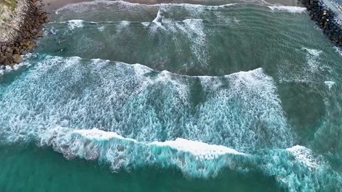 Aerial top view of ocean waves breaking on Antilla beach Stock Footage 346731418