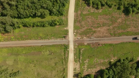 Aerial top view of old freight train with many cars moving on country area Video stock 129081149