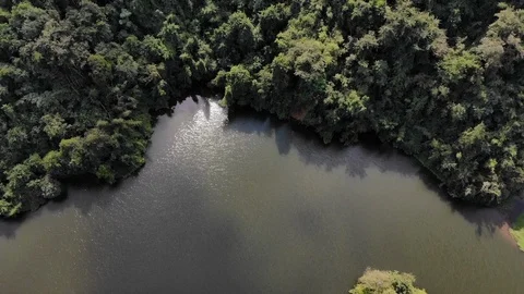 Aerial top view over river on spring season with mountain green jungle Stock Footage 107459253