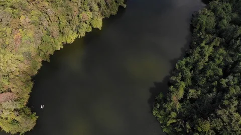 Aerial top view over river on spring season with mountain green jungle Stock Footage 107459512