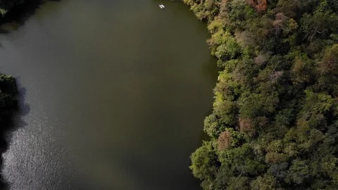 Aerial top view over river on spring season with mountain green jungle Stock Footage 107463853