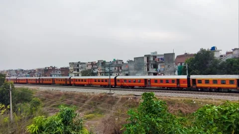 Aerial Top View of Passenger Train Moving on Historic Railway Track in Chandigar Stock Footage 328250050