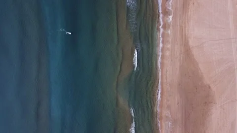 Aerial top view of person doing paddle surf at the beach Stock Footage 258282645
