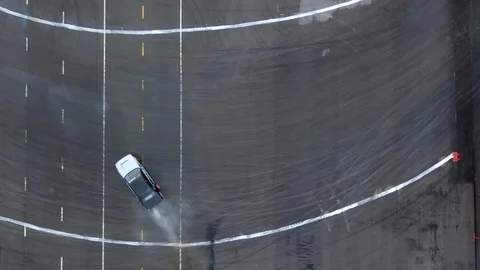 Aerial top view professional driver drifting car Stock Footage 93914831