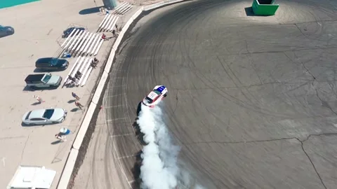 Aerial top view professional driver drifting car on asphalt road track Stock Footage 255025935