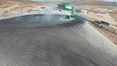 Aerial top view professional driver drifting car on asphalt road track, Stock Footage 256292687