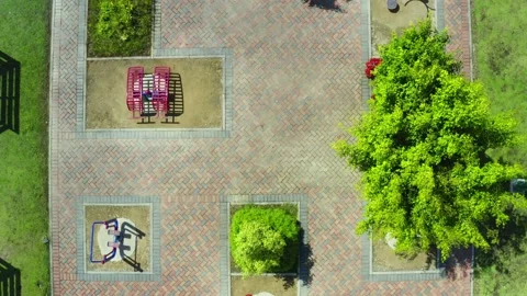 Aerial top view of a public park with many work-out equipment without people Stock Footage