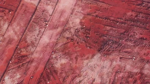 Aerial top view of red muck on construction site Stock Footage 234464692