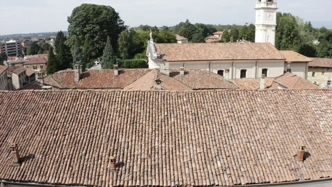 Aerial top view of red tiles roof in local European town on sunny summer day.  Stock Footage 120597154