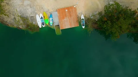 Aerial top view of the resort in Cap Cana, lake with a beach for paddleboarding Video stock 306555969