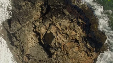 Aerial Top View rocks Close Up Pull Out To Reveal Ocean, Maui Stock Footage 74118035