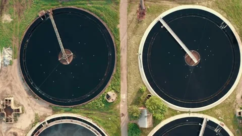 Aerial top view of round polls in wastewater treatment plant, drone shot Stock Footage 132364962