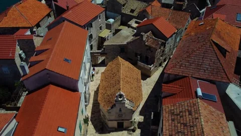 Aerial top view of saint john's church in jelsa, hvar, croatia Stock Footage 340182214