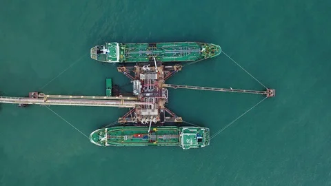Aerial top view of the ship carrying the lpg and oil tanker in the sea port.  Video stock 108666997