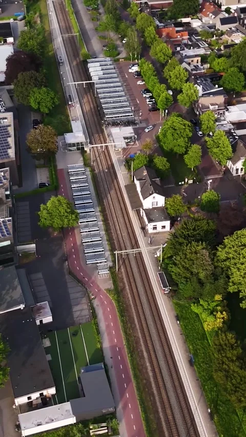 Aerial top view of a small town train station Vídeo Stock 336496543
