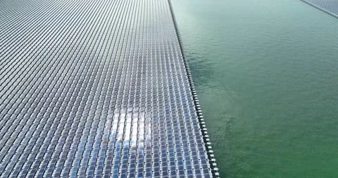 Aerial top view of solar panels or solar cells on buoy floating in lake sea Stock Footage 170656244