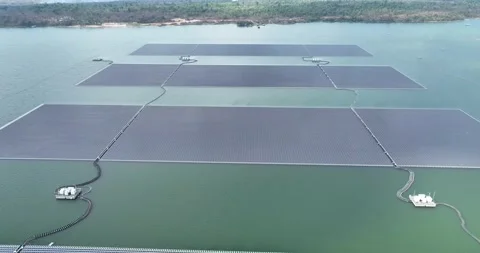 Aerial top view of solar panels or solar cells on buoy floating in lake sea Stock Footage 170656320