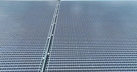 Aerial top view of solar panels or solar cells on buoy floating in lake sea Stock Footage 170656334