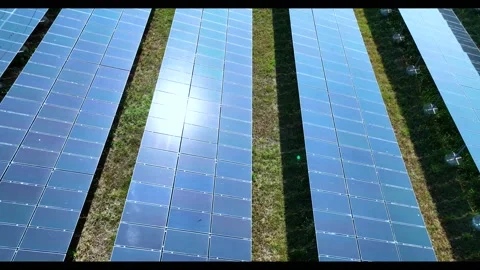 Aerial top view of solar panels or solar cells farm reflection with sunlight. Stock Footage 172397646