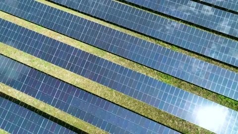 Aerial top view of solar panels or solar cells farm reflection with sunlight. Stock Footage 172397648