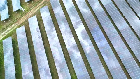 Aerial top view of solar panels or solar cells farm reflection with sunlight. Stock Footage 176055430