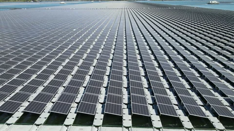 Aerial top view of solar panels or solar cells on buoy floating in lake. Stock Footage 234093744