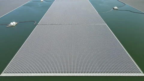 Aerial top view of solar panels or solar cells on buoy floating in lake. Stock Footage 234094904