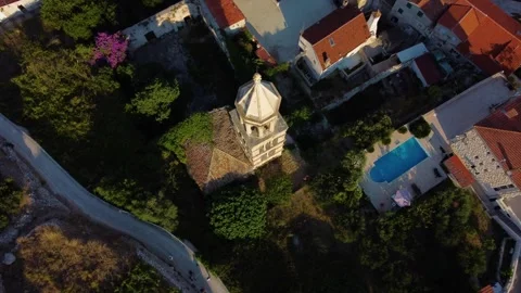 Aerial top view of st. Mark church tower in hvar, croatia Video stock 340381233