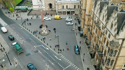 Aerial top view Time Lapse of many tourists in front of Westminster Abbey Stock Footage 180289877