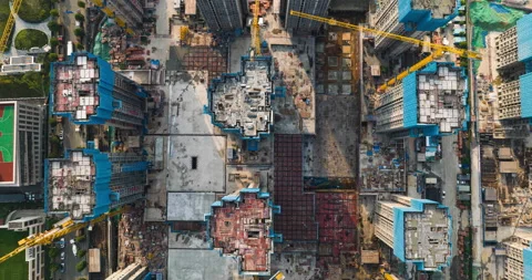 Aerial top view timelapse of Large busy working construction site  Vídeos de archivo 221880304