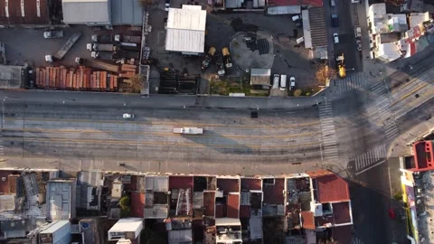Aerial top view tracking bus on avenue in Buenos Aires during sunset Stock Footage 160516403