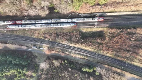 Aerial Top View of Two Trains Passing on Parallel Railway Tracks Vídeos de archivo 327974753
