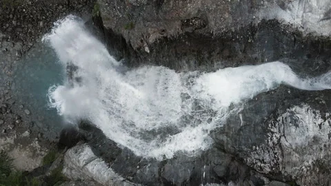 Aerial top view of Val Nera waterfall in Livigno Видео 256210062