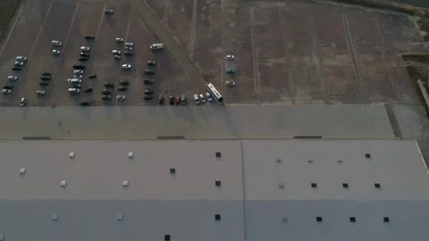 Aerial Top View of Warehouse Rooftop and Parking Lot Stock-Footage 336178791