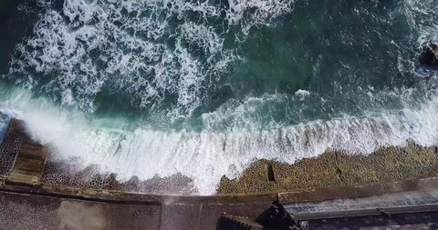 Aerial top view waves break on sand beach. Sea waves on beautiful beach aeria Stock Footage 111043727