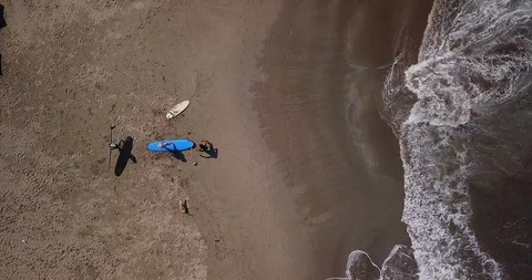 Aerial top view waves break on sand beach. Sea waves on beautiful beach aeria Stock Footage 111045133