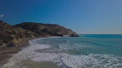 Aerial top view waves break on beach Stock Footage 122813793
